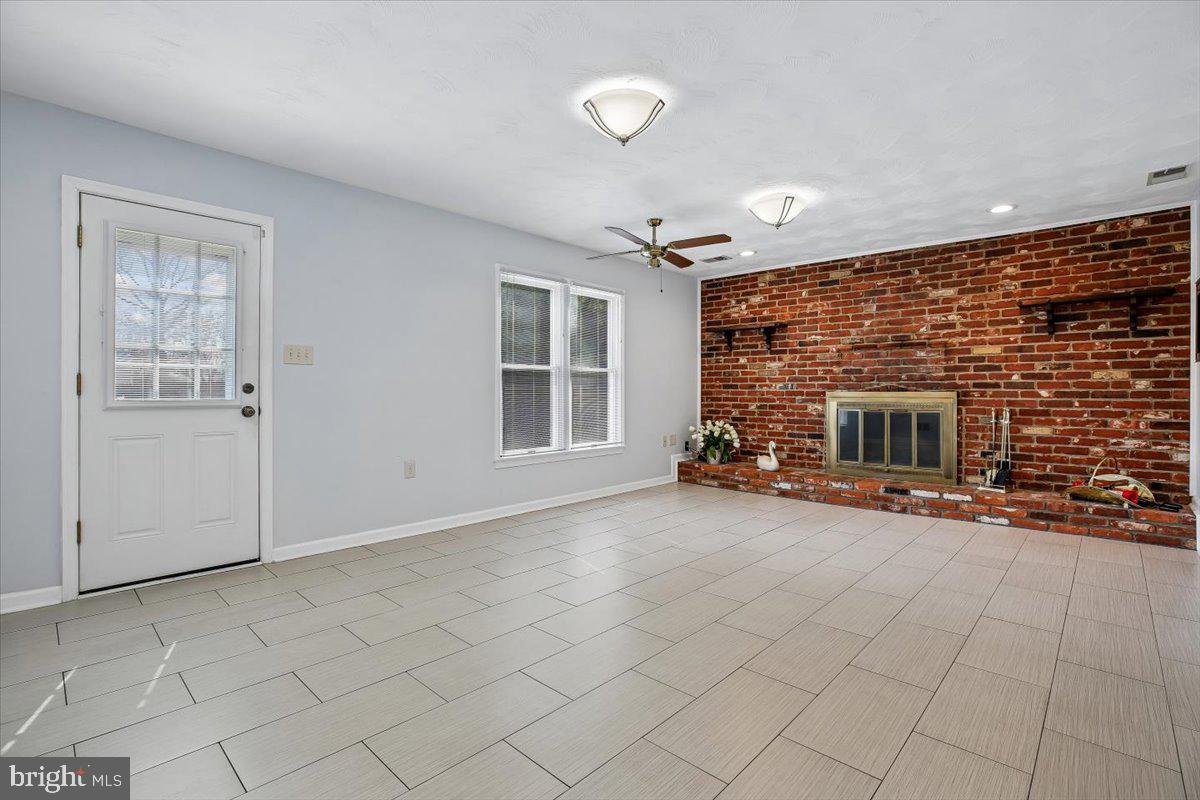 1913 Hopefield Road Silver Spring, MD 20905 - Photo 22 of 58 an empty room with windows