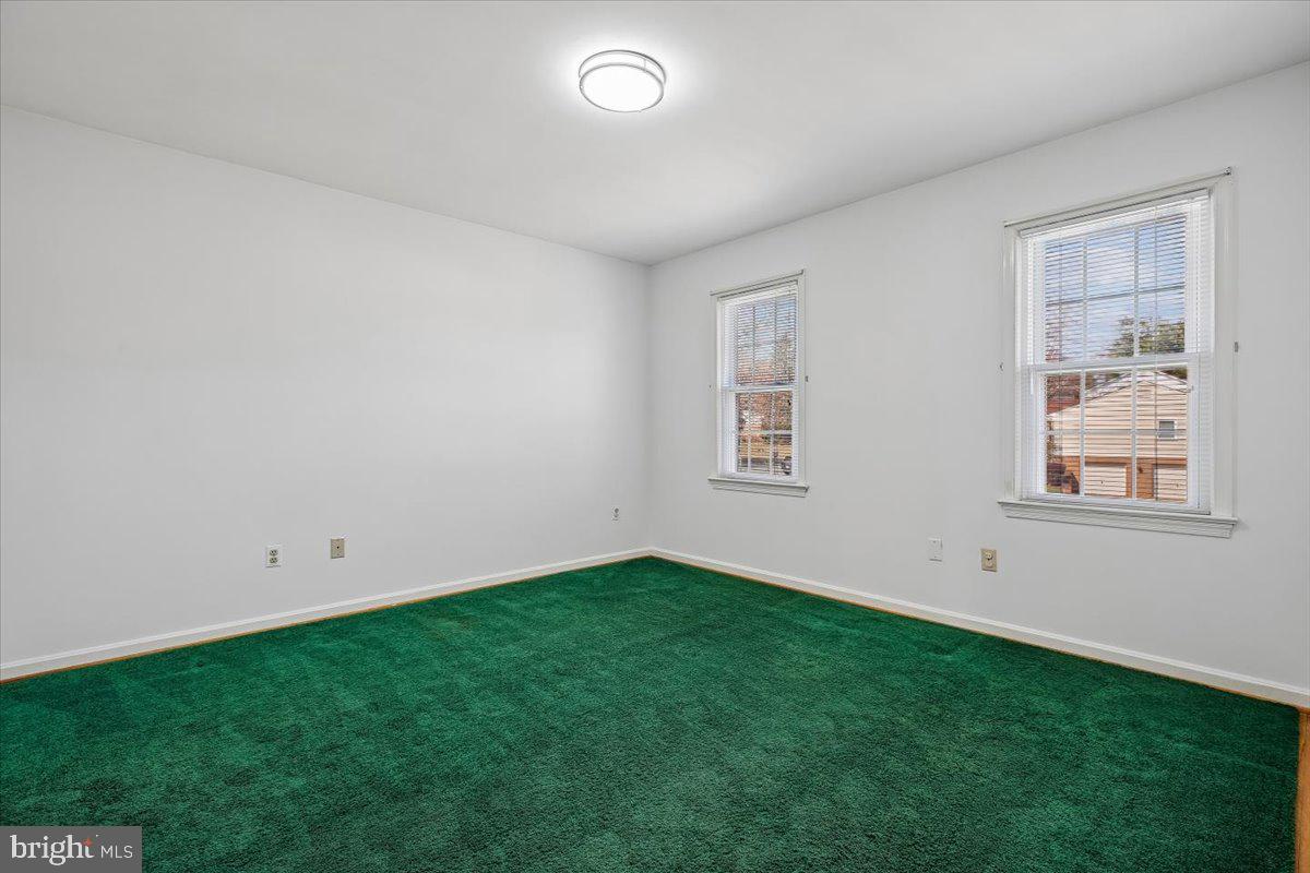1913 Hopefield Road Silver Spring, MD 20905 - Photo 35 of 58 a view of an empty room with window
