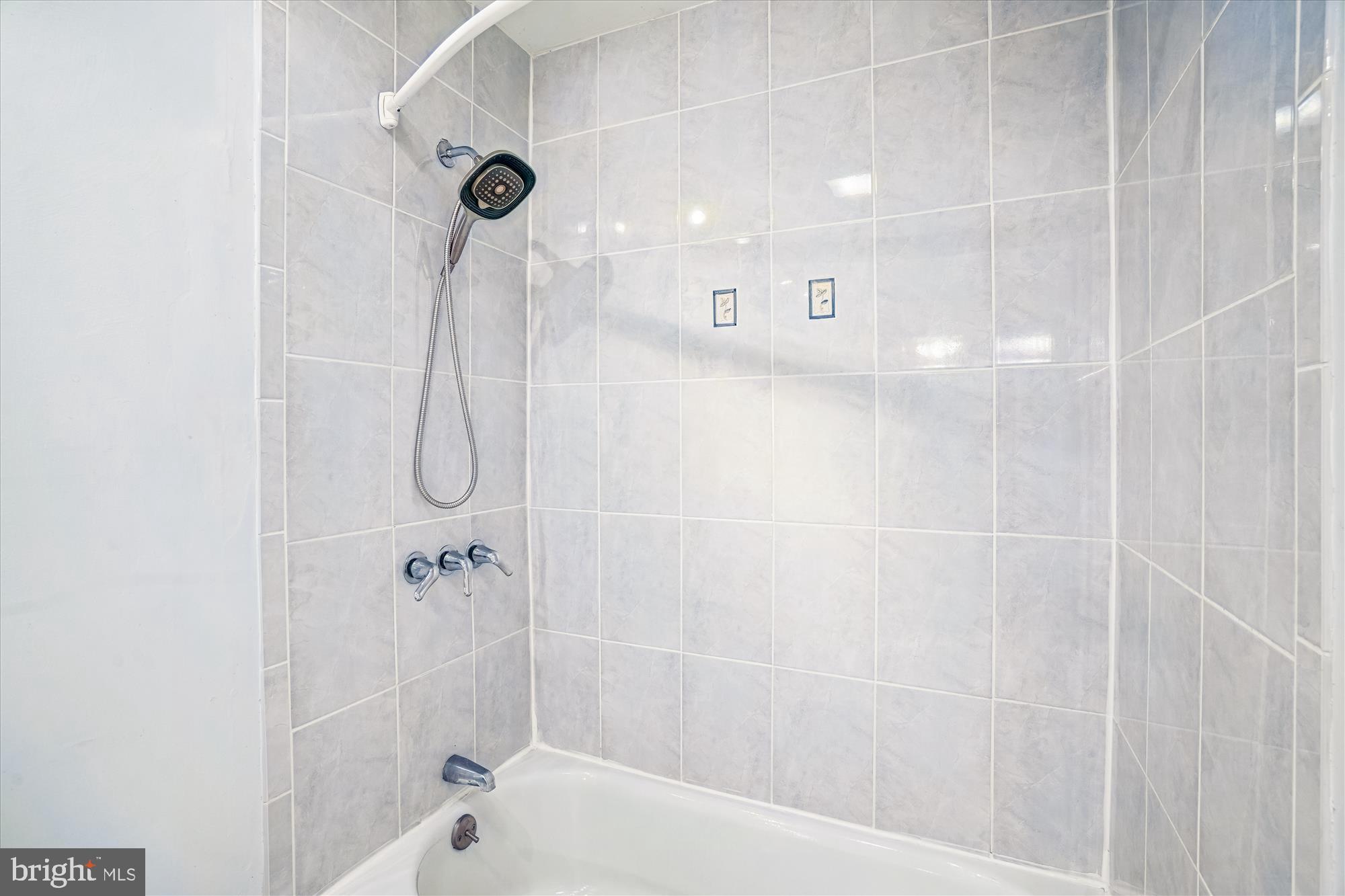 1913 Hopefield Road Silver Spring, MD 20905 - Photo 38 of 58 a bathroom with a shower and a shower