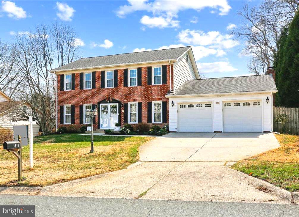 1913 Hopefield Road Silver Spring, MD 20905 - Photo 4 of 58 a view of a brick house with a swimming pool
