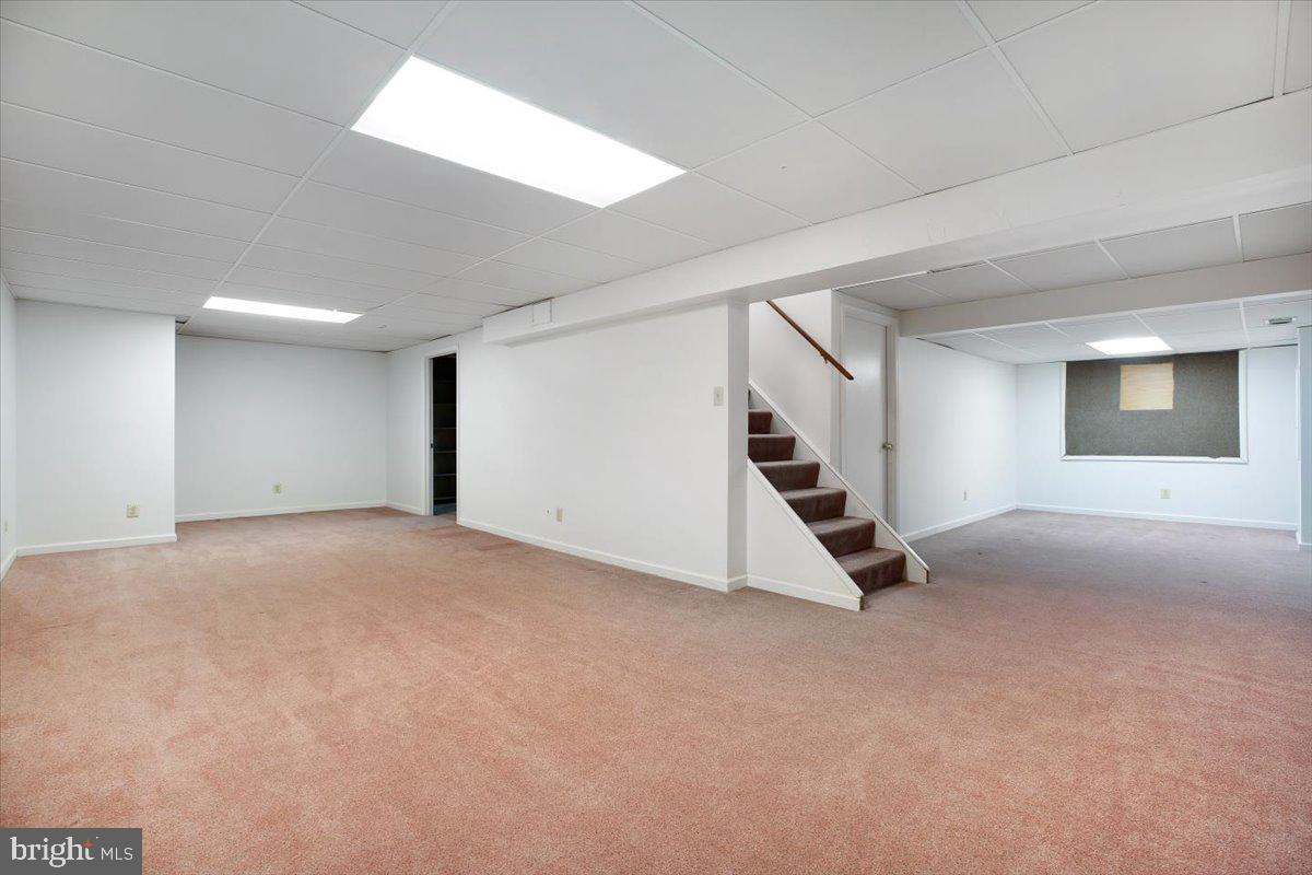 1913 Hopefield Road Silver Spring, MD 20905 - Photo 44 of 58 a view of an empty room with stairs
