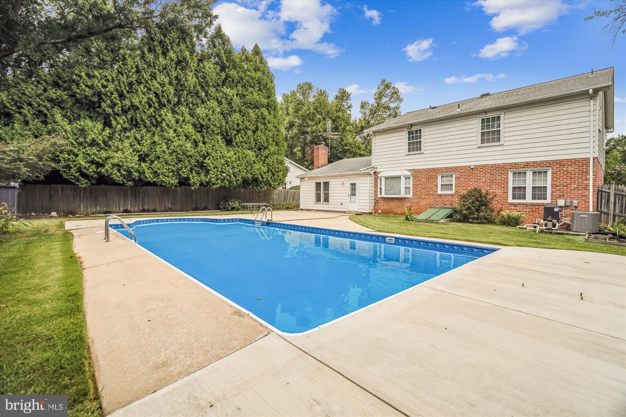 1913 Hopefield Road Silver Spring, MD 20905 - Photo 52 of 58 a view of a swimming pool with an outdoor seating