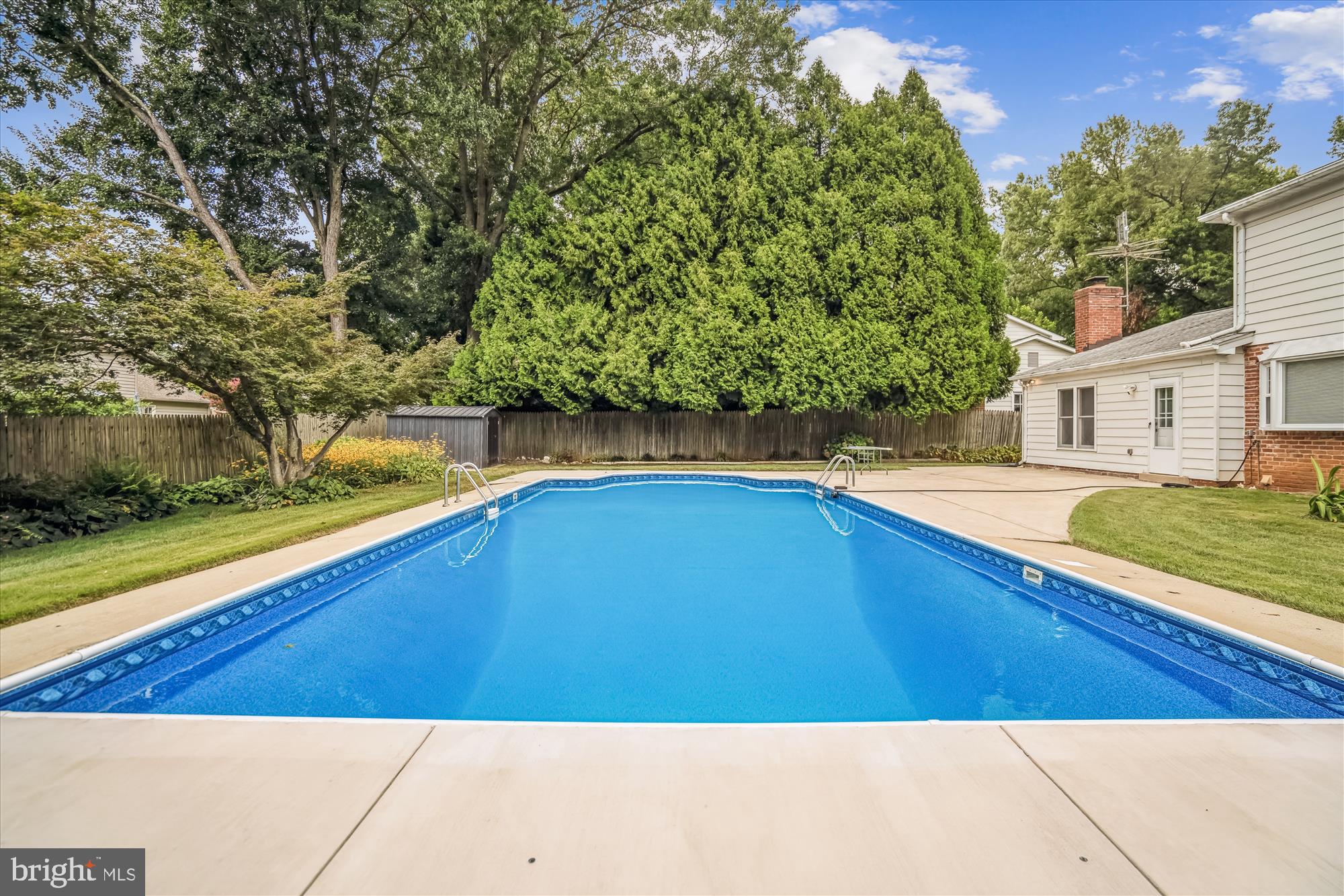 1913 Hopefield Road Silver Spring, MD 20905 - Photo 54 of 58 a view of a swimming pool with an outdoor seating