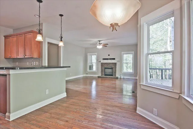 a bathroom with a glass shower door and mirror