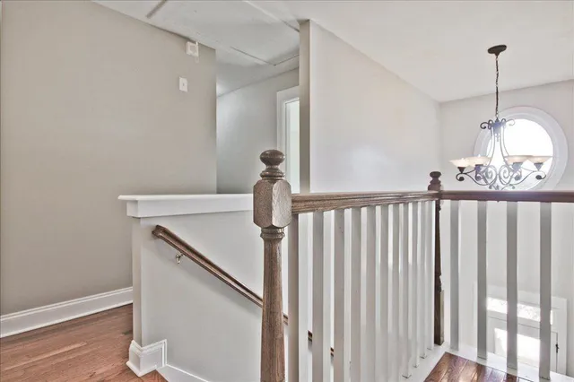 a bathroom with a granite countertop sink mirror and shower