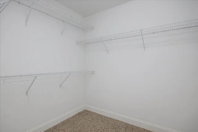 a view of wooden deck and a garden