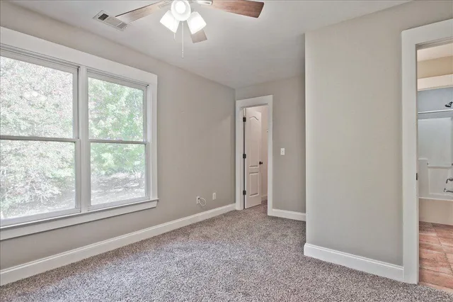 a balcony with view of trees