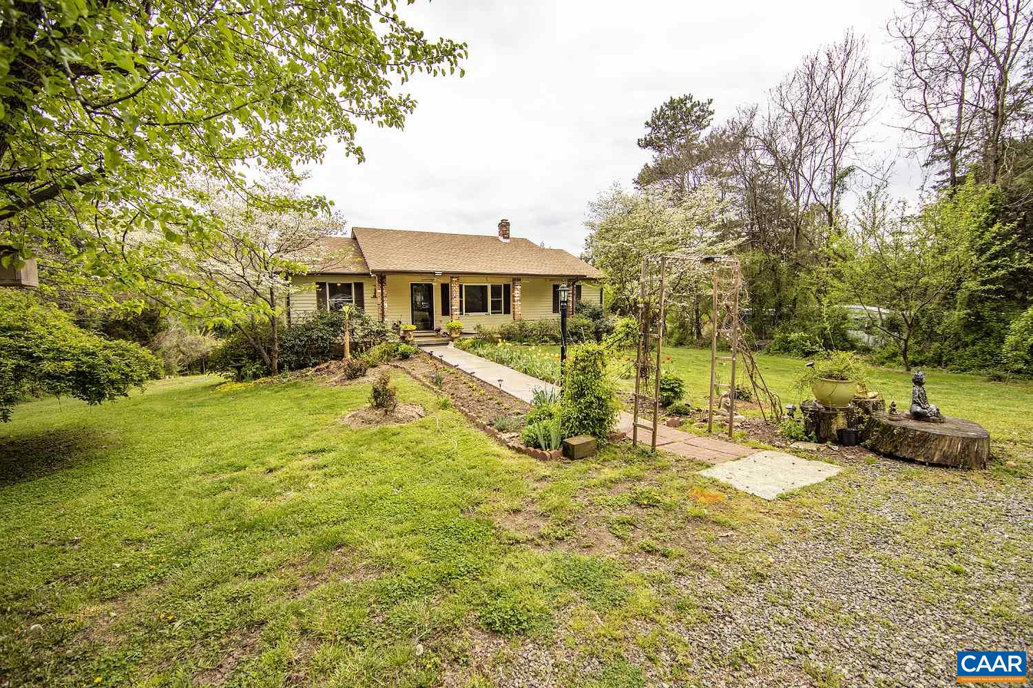 153 Morning Glory Road Ruckersville, VA 22968 - Photo 5 of 33 a view of a house with swimming pool and sitting area
