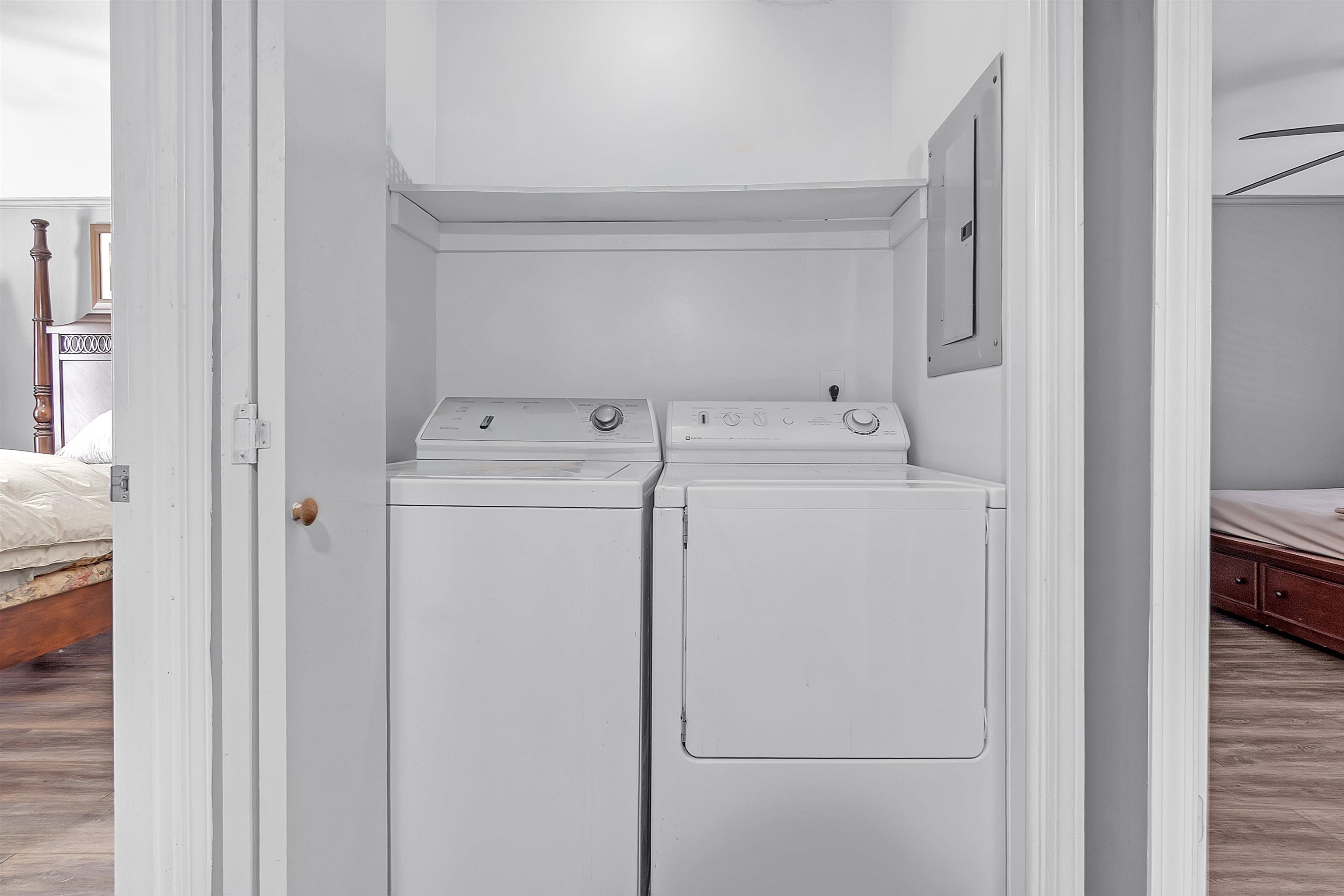 5866 Roxbury Drive, Unit 5866 Memphis, TN 38119 - Photo 15 of 16 Laundry area featuring wood finished floors, electric panel, independent washer and dryer, and ceiling fan