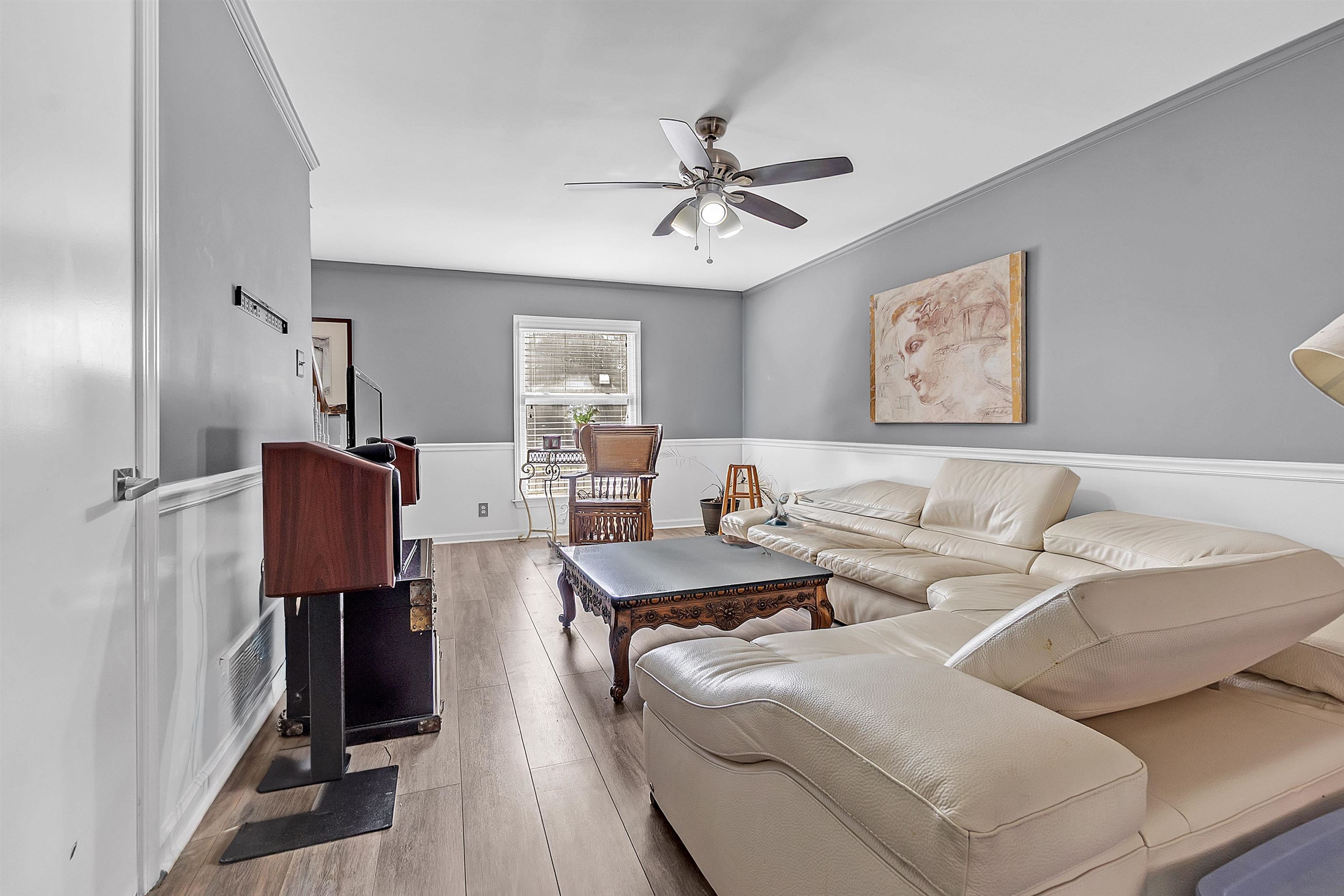 5866 Roxbury Drive, Unit 5866 Memphis, TN 38119 - Photo 4 of 16 Living room featuring ornamental molding, light wood-style floors, and a ceiling fan