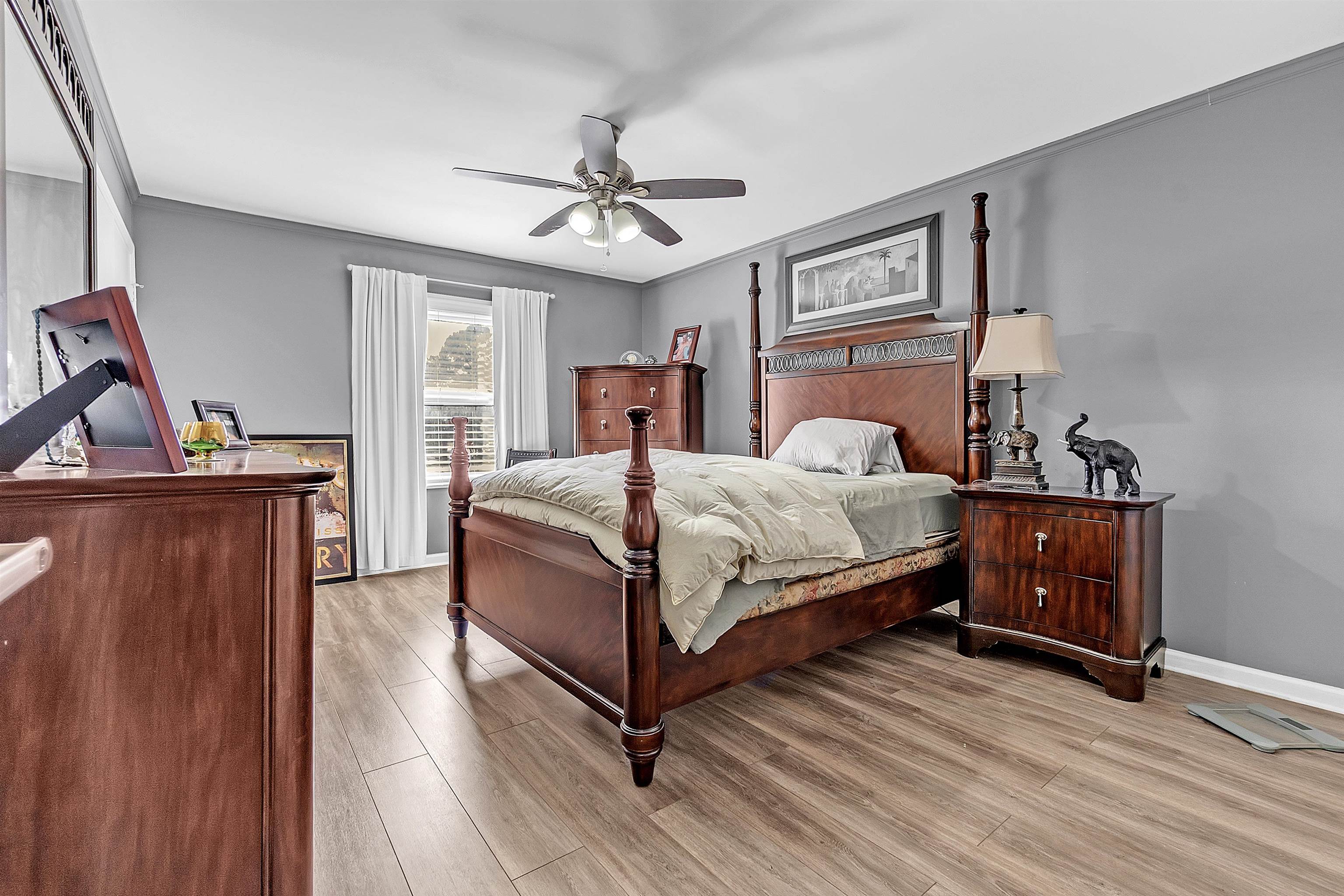 5866 Roxbury Drive, Unit 5866 Memphis, TN 38119 - Photo 10 of 16 Bedroom featuring light wood-type flooring, crown molding, and a ceiling fan