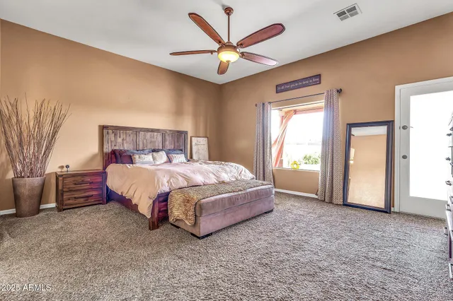 a bathroom with a granite countertop sink mirror and double