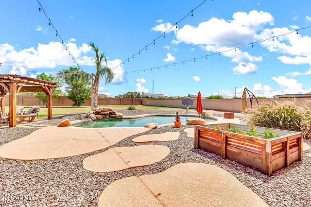 a view of outdoor kitchen and dining room