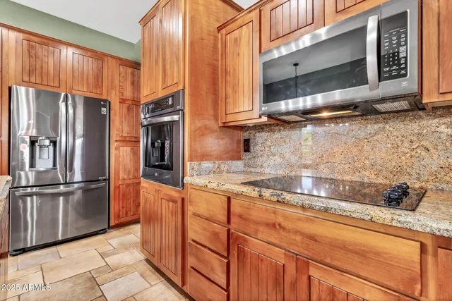 a view of a hallway with dining area and livingroom view