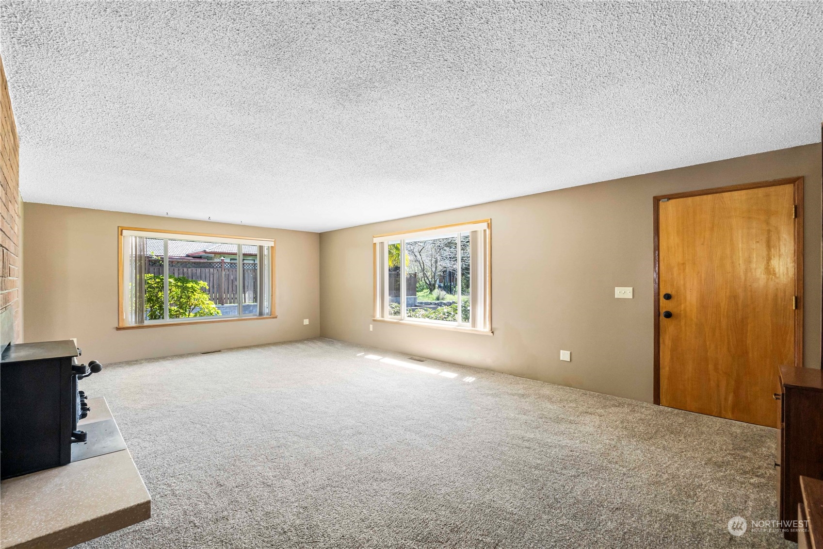 16238 Southeast 144th Street Renton, WA 98059 - Photo 13 of 32 an empty room with windows and closet