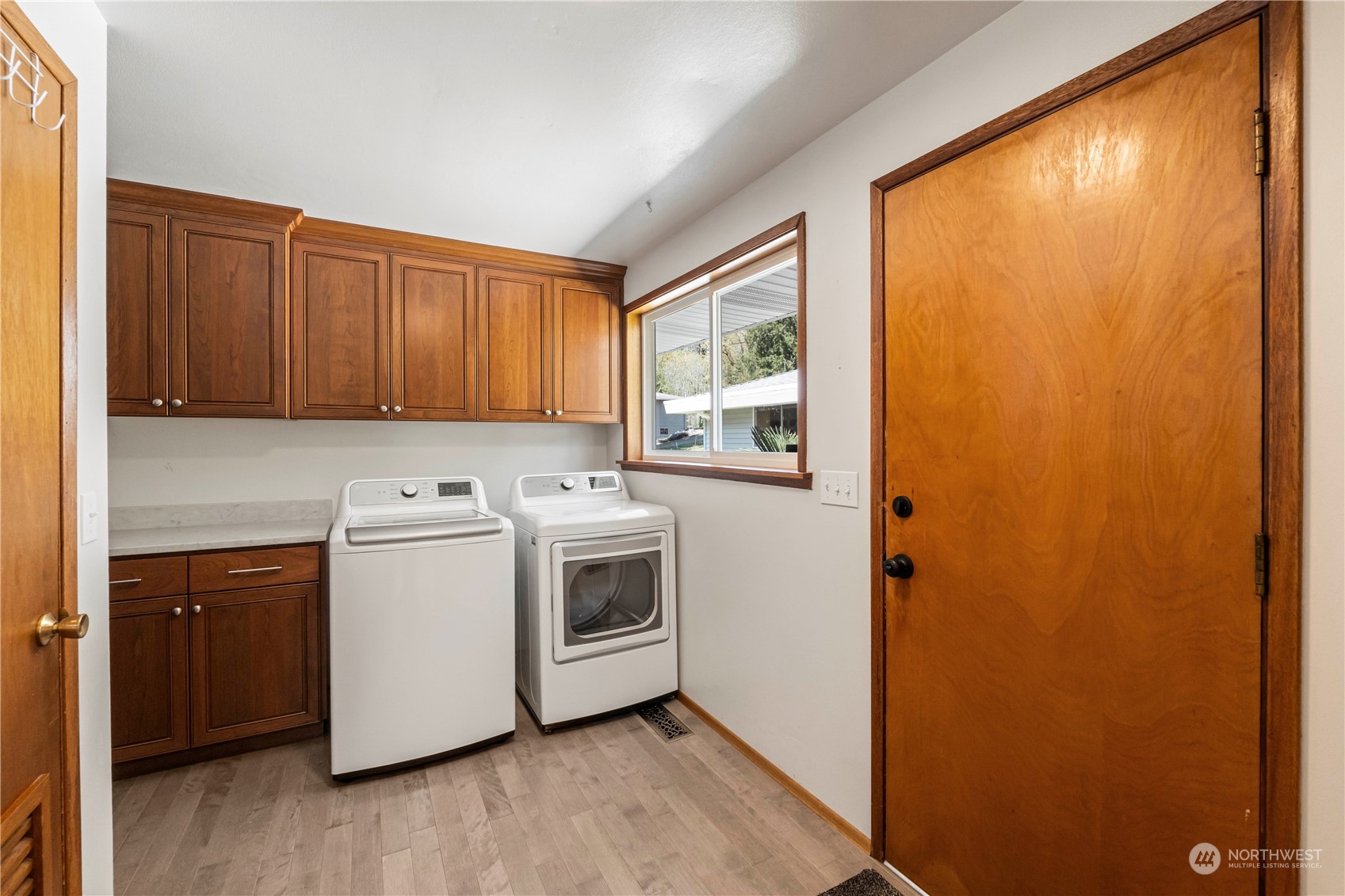 16238 Southeast 144th Street Renton, WA 98059 - Photo 17 of 32 a view of a kitchen with washer and dryer