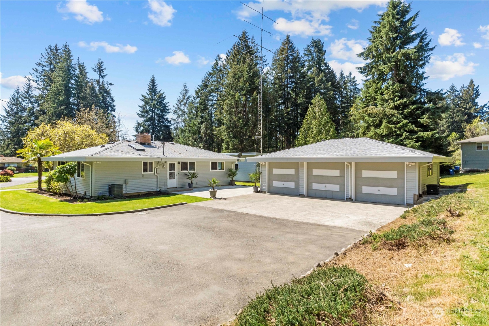 16238 Southeast 144th Street Renton, WA 98059 - Photo 25 of 32 a front view of a house with a garden