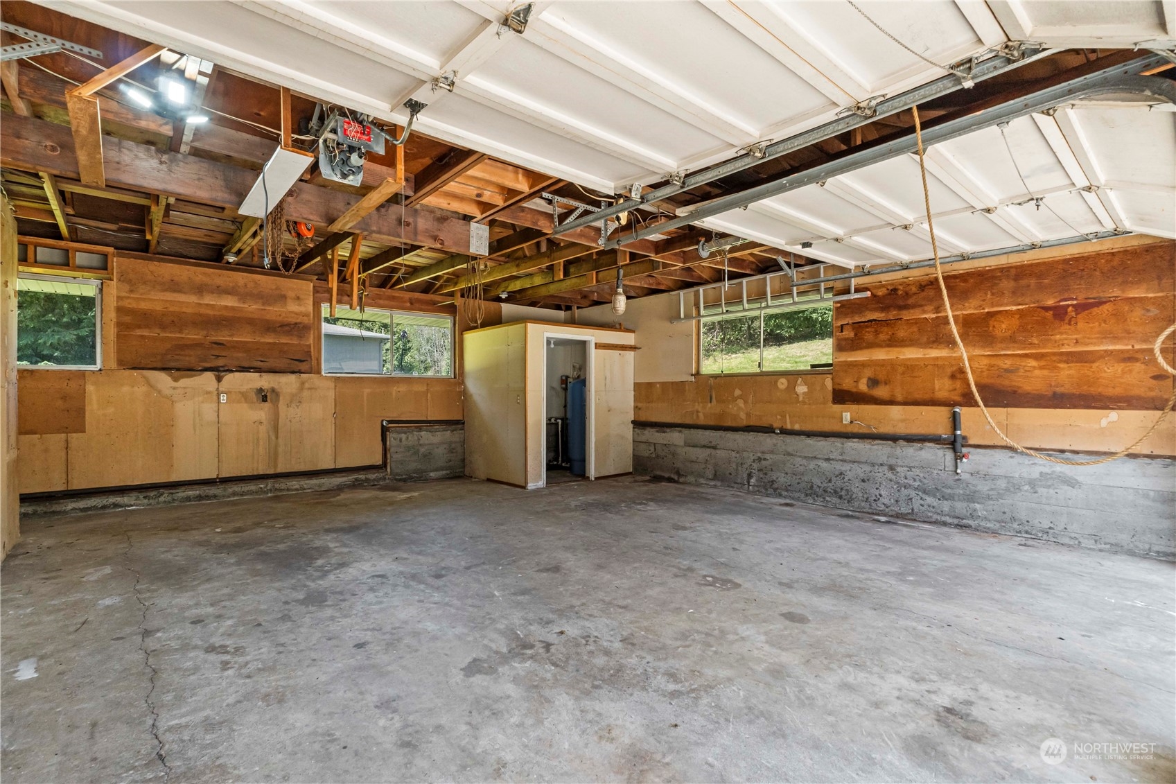 16238 Southeast 144th Street Renton, WA 98059 - Photo 27 of 32 a view of a room with wooden walls