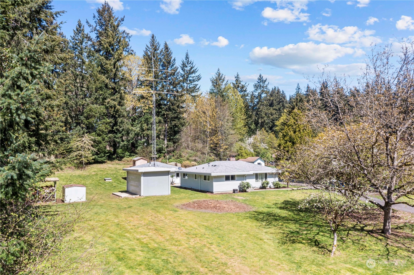 16238 Southeast 144th Street Renton, WA 98059 - Photo 32 of 32 a view of a swimming pool with a yard and mountain view