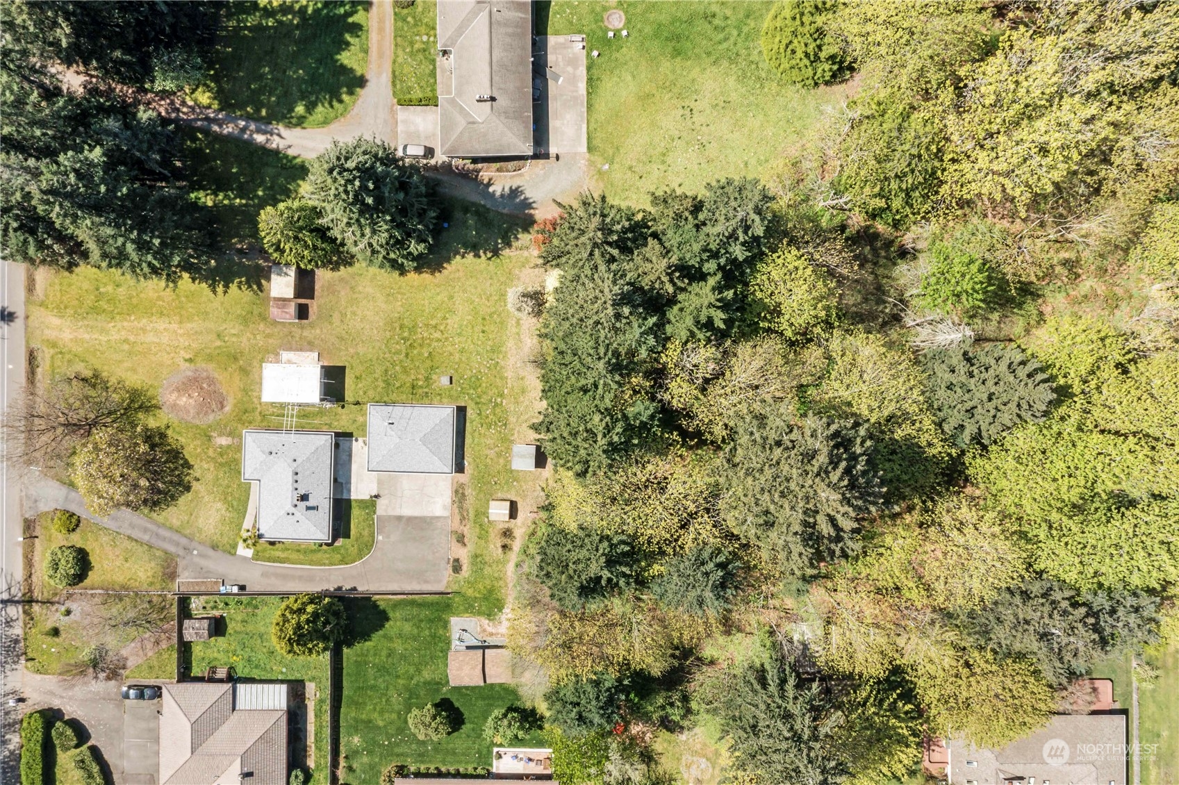 16238 Southeast 144th Street Renton, WA 98059 - Photo 7 of 32 an aerial view of residential houses with outdoor space