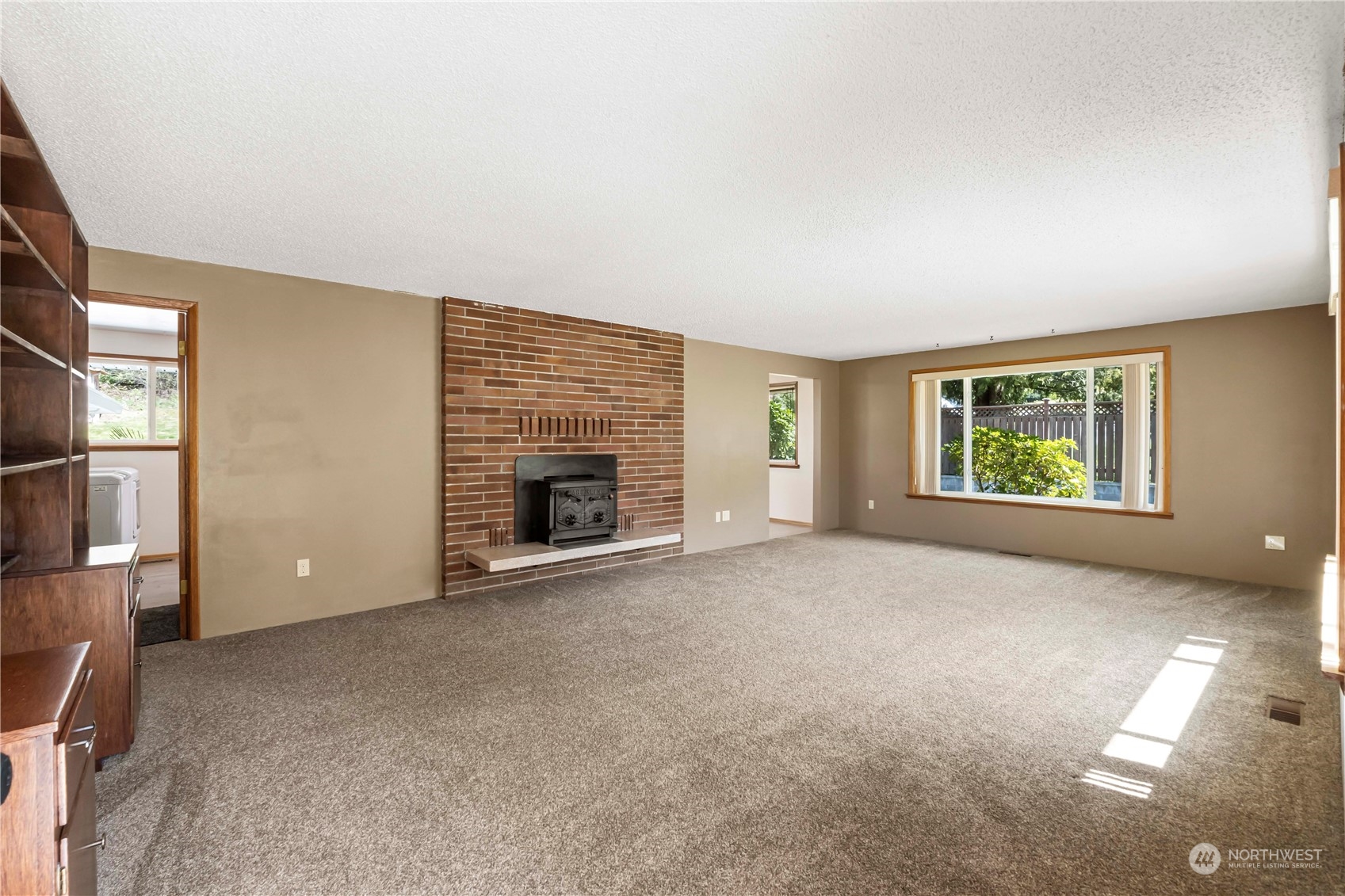 16238 Southeast 144th Street Renton, WA 98059 - Photo 10 of 32 an empty room with windows