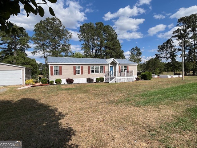 front view of house with a yard