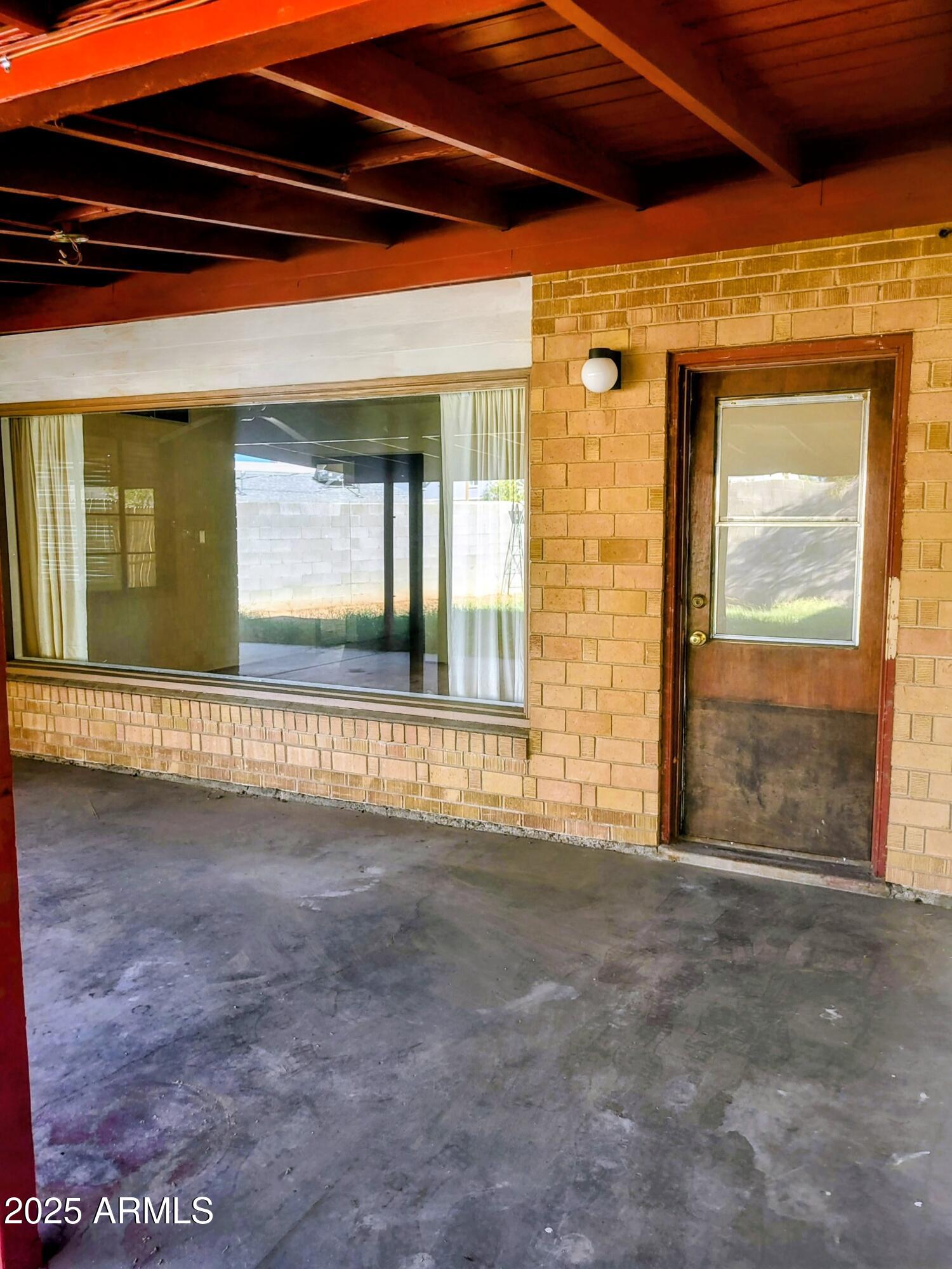 1704 West Colter Street, Unit 1 Phoenix, AZ 85015 - Photo 23 of 25 a view of an entrance of the house