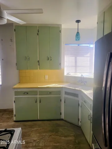 a room with a stove and a window