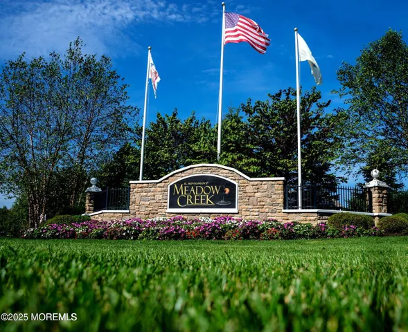 a view of a field and basketball court