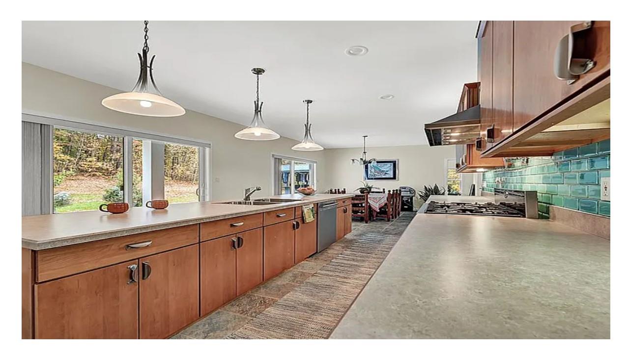 190 Penaluna Road Monroe, NY 10950 - Photo 17 of 36 a large kitchen with kitchen island a large island in it