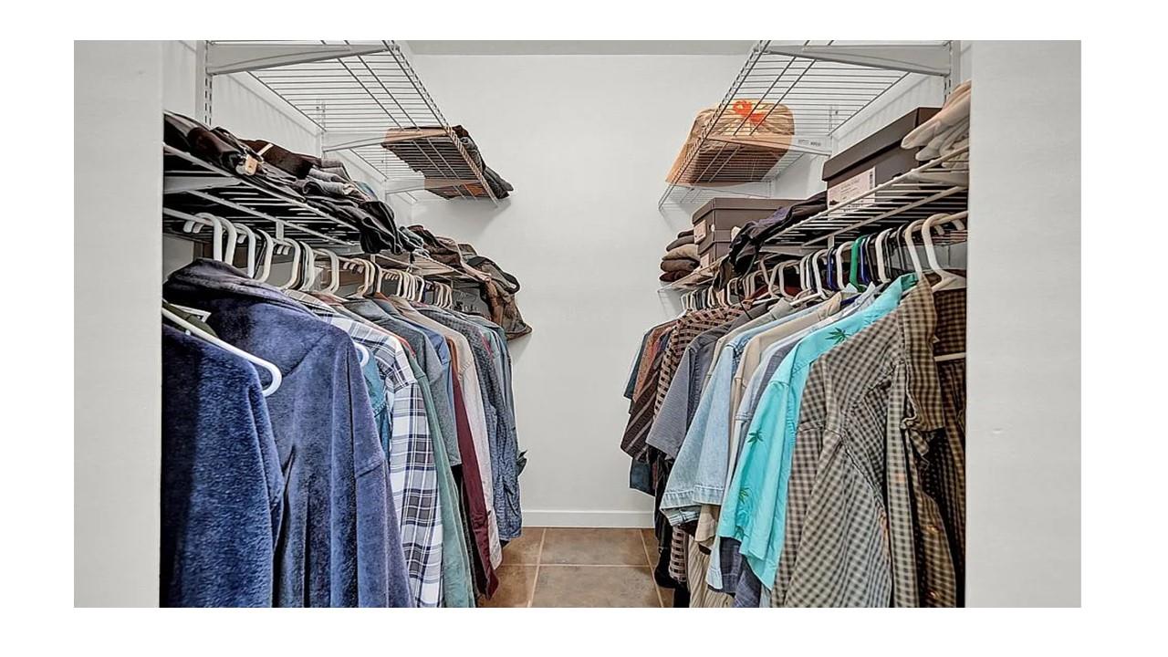 190 Penaluna Road Monroe, NY 10950 - Photo 21 of 36 a view of walk in closet with clothes and shoes