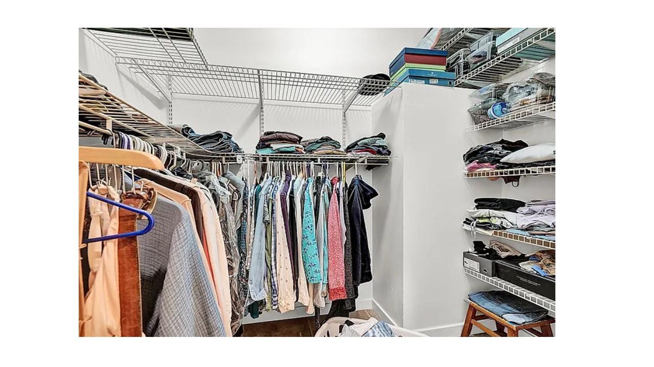 190 Penaluna Road Monroe, NY 10950 - Photo 22 of 36 a view of walk in closet with clothes and shoes