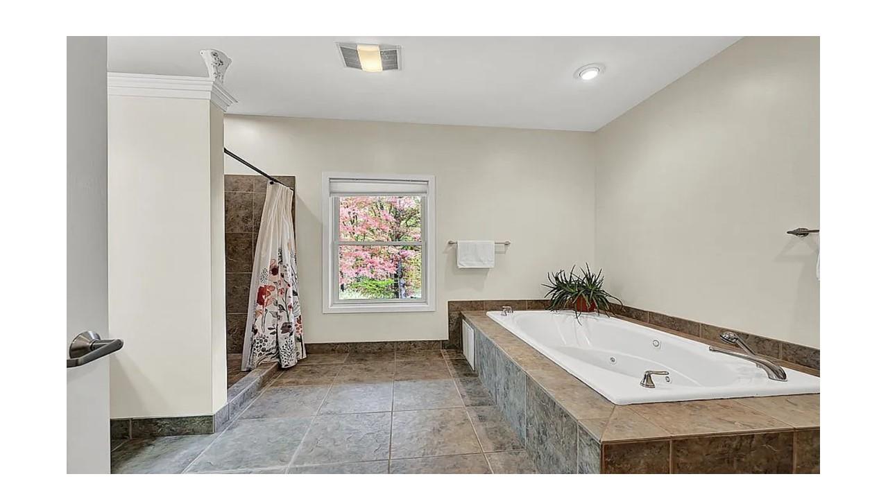 190 Penaluna Road Monroe, NY 10950 - Photo 23 of 36 a bathroom with a bathtub and a sink