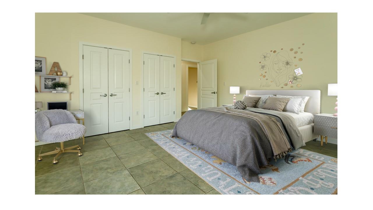 190 Penaluna Road Monroe, NY 10950 - Photo 24 of 36 a bedroom with a bed and a painting on the wall