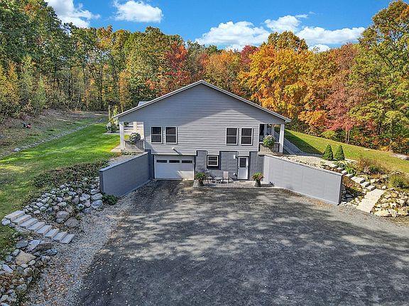 190 Penaluna Road Monroe, NY 10950 - Photo 4 of 36 a view of a house with a yard and fence