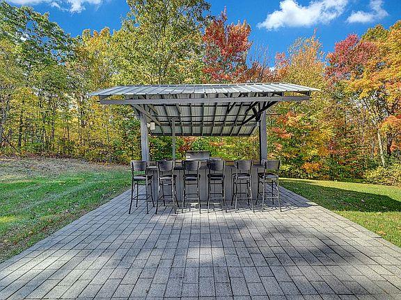 190 Penaluna Road Monroe, NY 10950 - Photo 10 of 36 a view of patio with lawn chairs and wooden floor