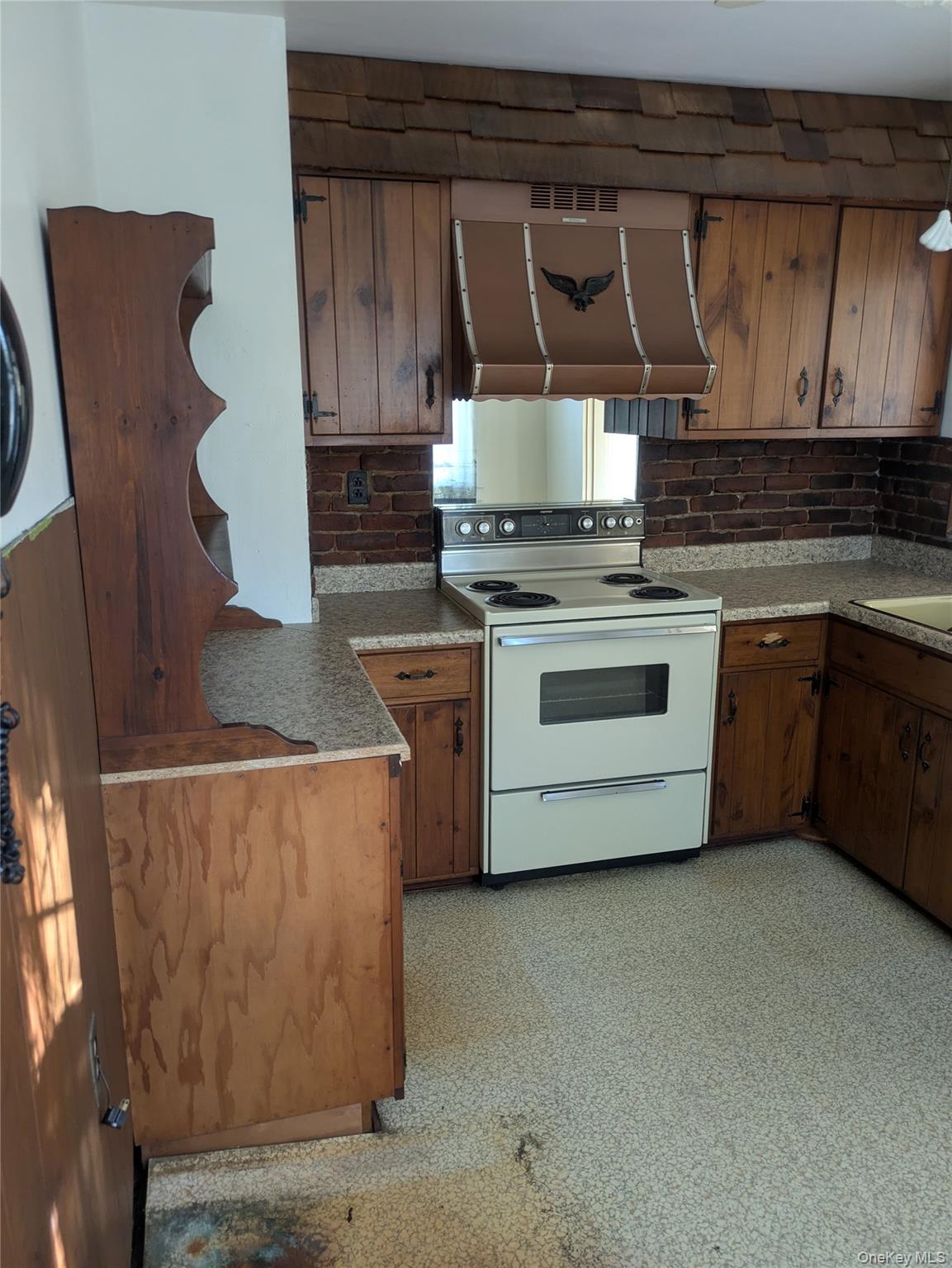 55 Old Little Britain Road Newburgh, NY 12550 - Photo 11 of 44 a kitchen with stainless steel appliances granite countertop a stove a sink and a microwave