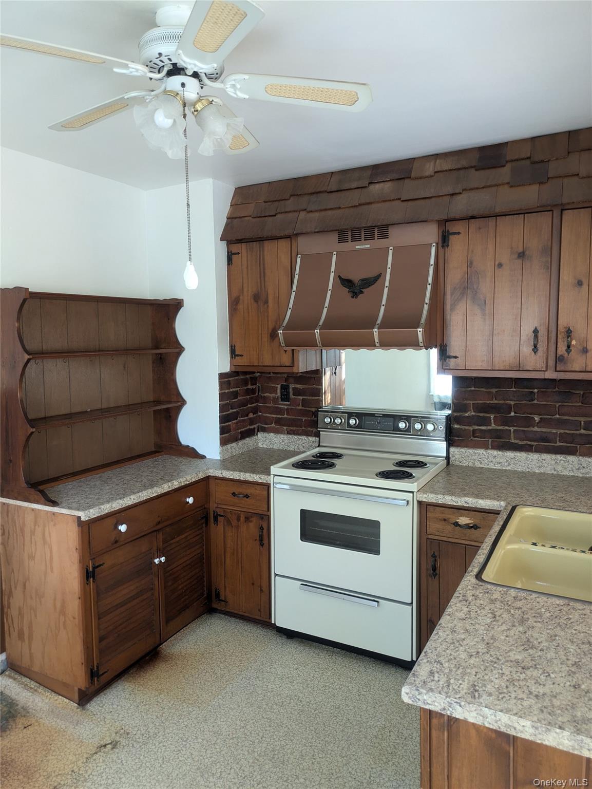 55 Old Little Britain Road Newburgh, NY 12550 - Photo 12 of 44 a kitchen with stainless steel appliances granite countertop a stove and a sink