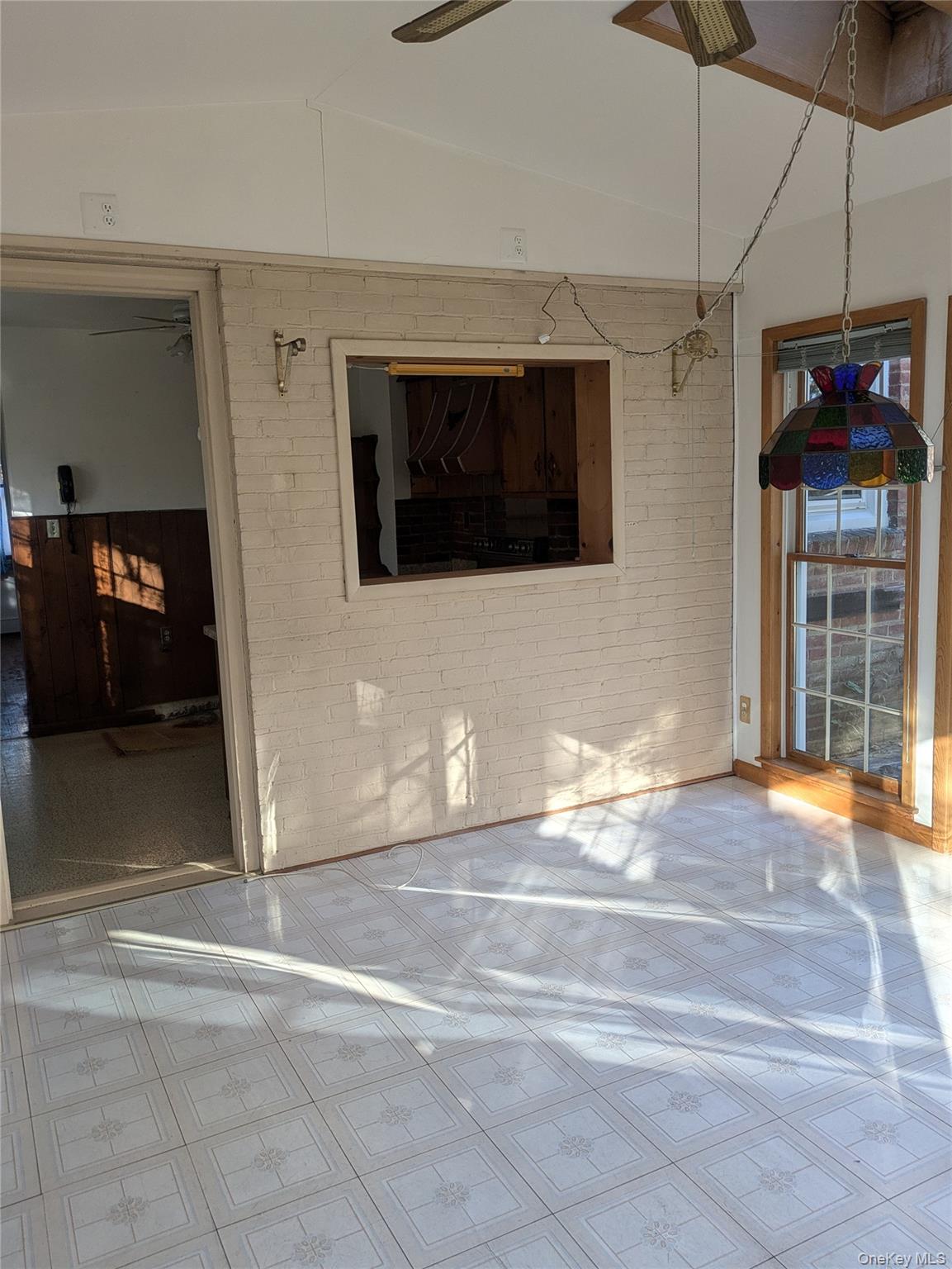 55 Old Little Britain Road Newburgh, NY 12550 - Photo 14 of 44 a view of an empty room with a fireplace and a window