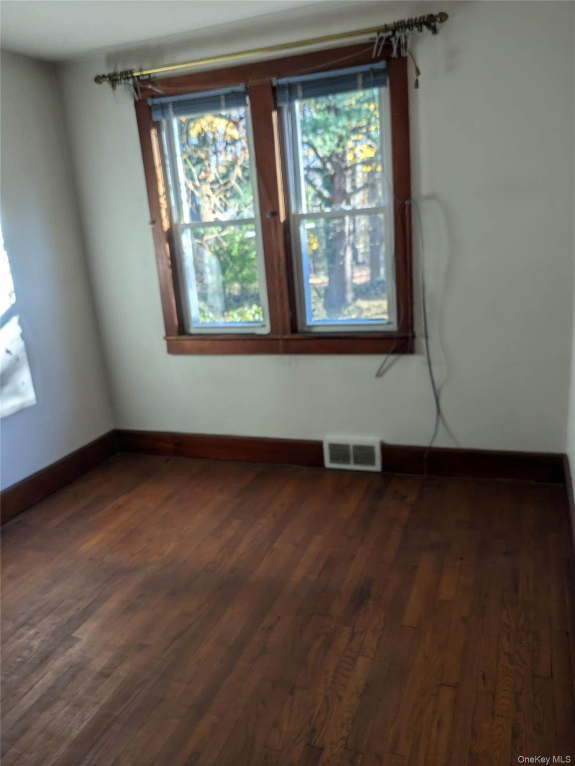 55 Old Little Britain Road Newburgh, NY 12550 - Photo 23 of 44 an empty room with wooden floor and windows