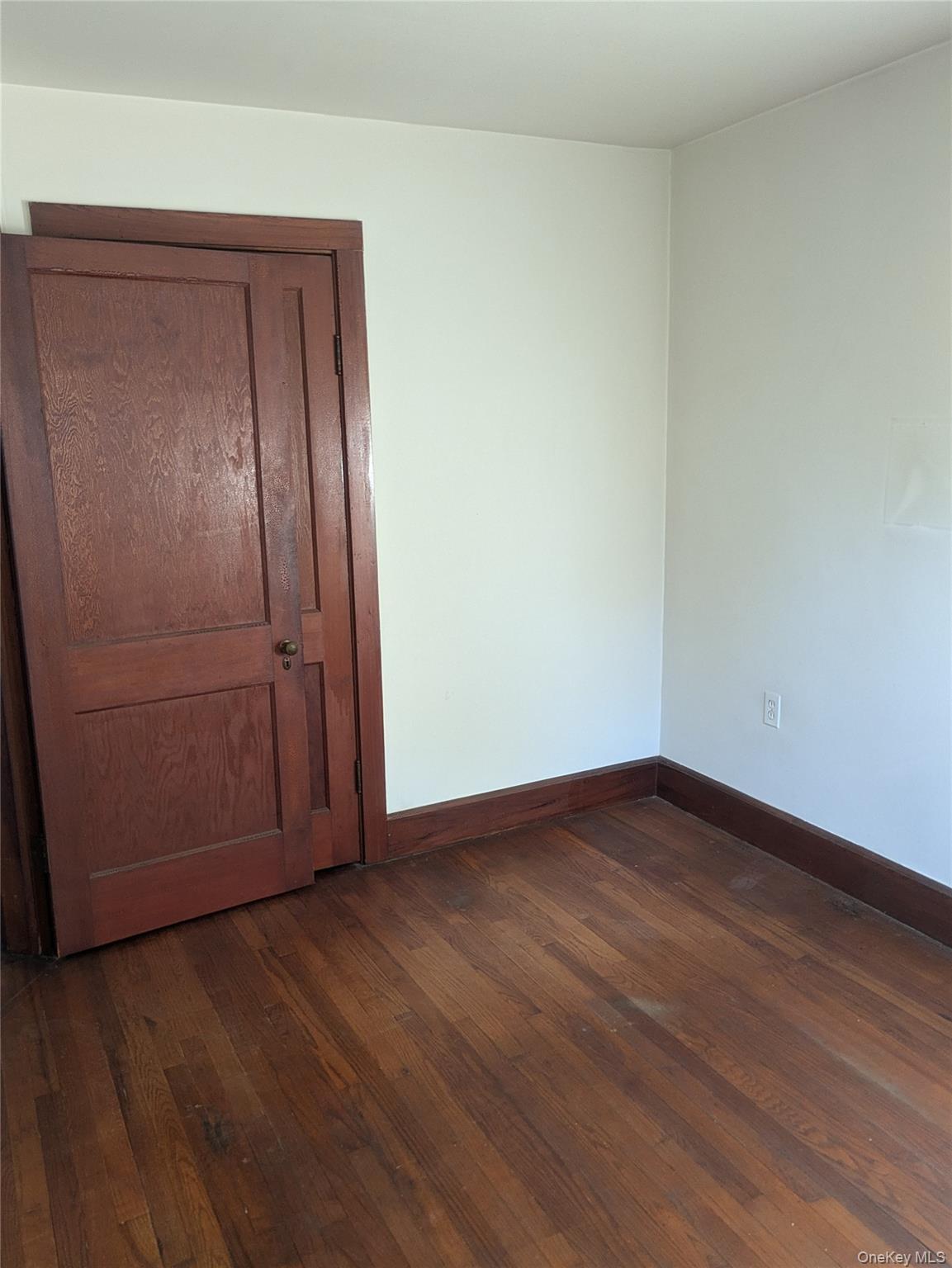55 Old Little Britain Road Newburgh, NY 12550 - Photo 24 of 44 a view of an empty room with wooden floor