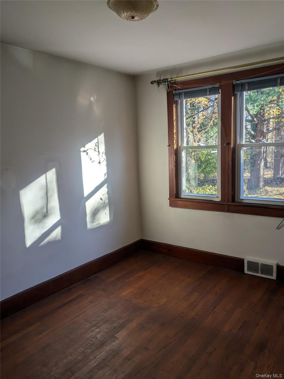 55 Old Little Britain Road Newburgh, NY 12550 - Photo 40 of 44 a view of an empty room with wooden floor and a window