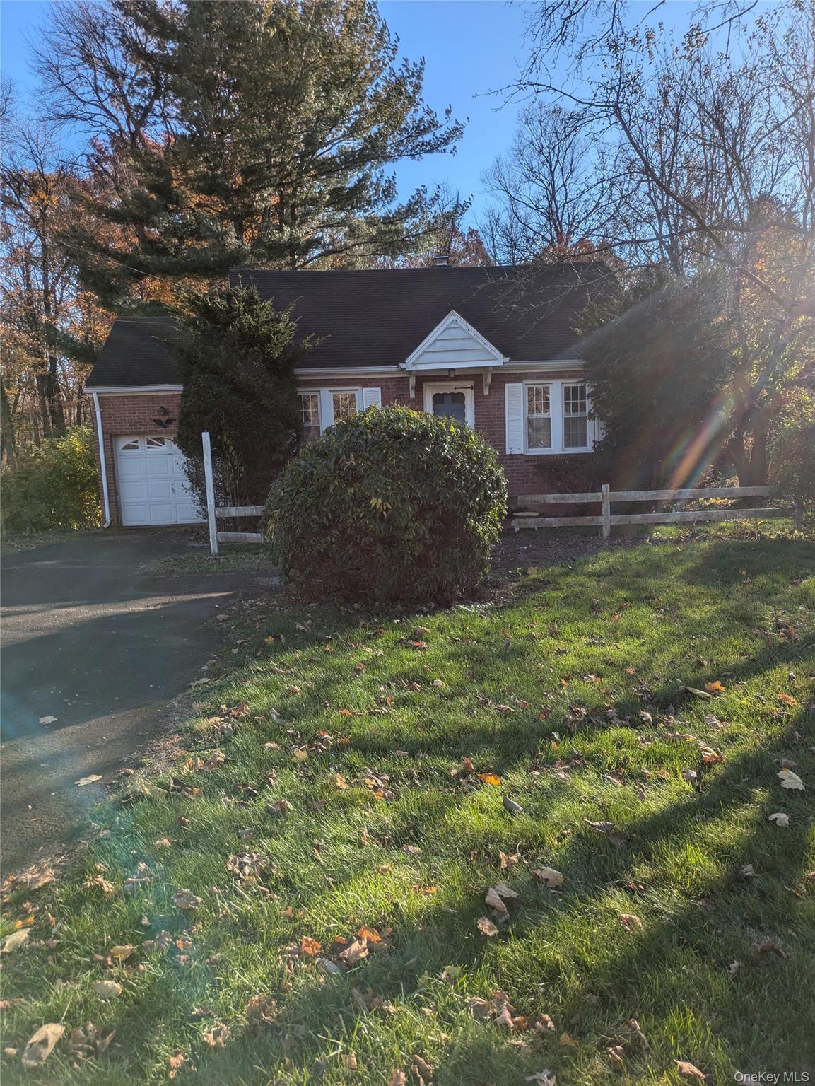 55 Old Little Britain Road Newburgh, NY 12550 - Photo 4 of 44 a front view of house with yard and trees in the background