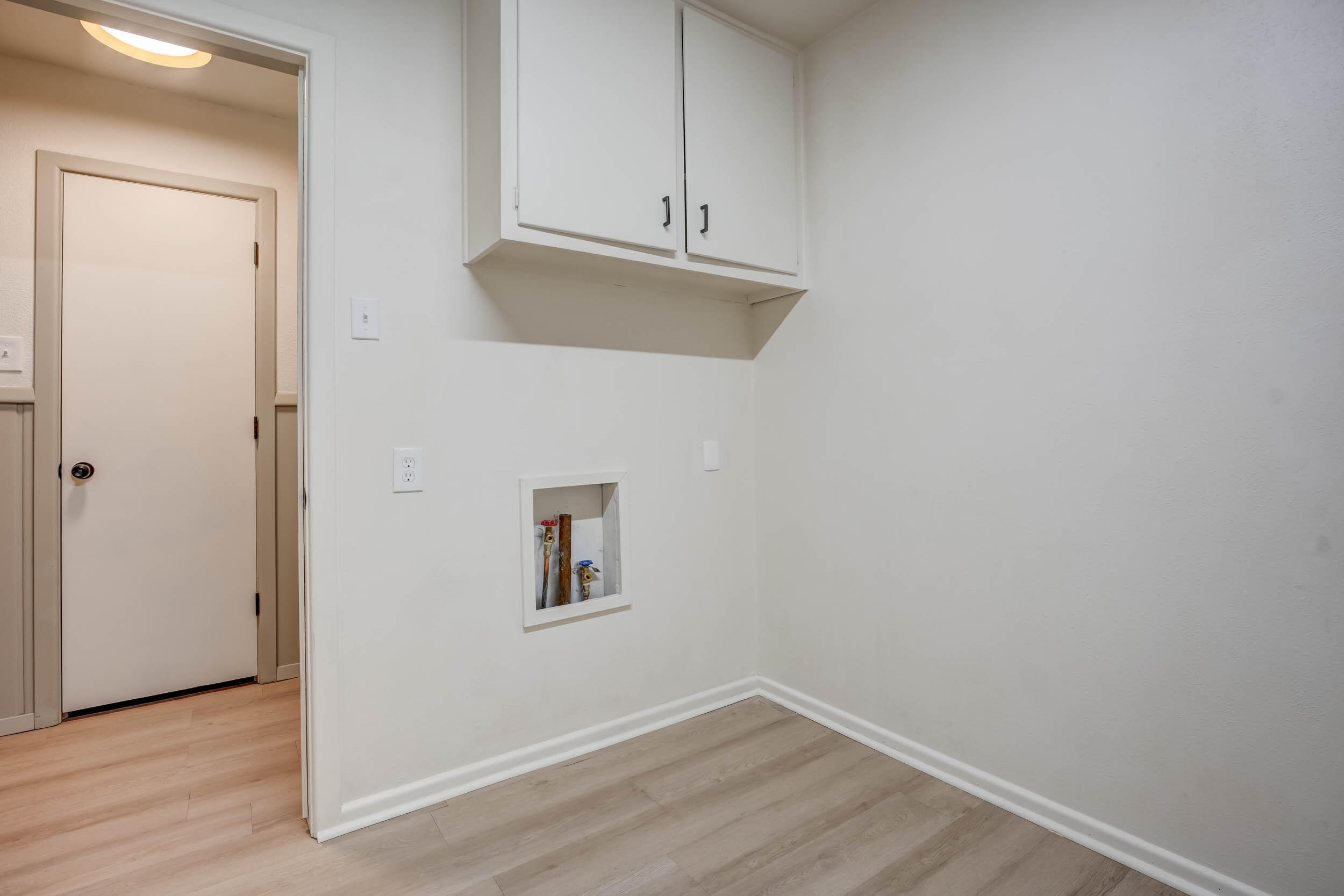 2101 64th Street Lubbock, TX 79412 - Photo 29 of 30 a view of a room with wooden floor