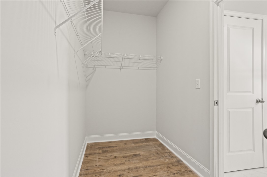554 Hydrangea Street, Unit LOT 67 Seneca, SC 29678 - Photo 16 of 26 Ample wire shelving provides practical storage in this well-appointed closet space.