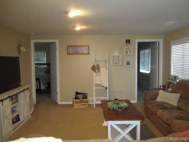 1403 Highland Road Highland, MI 48357 - Photo 9 of 18 1403 Highland living room.jpg