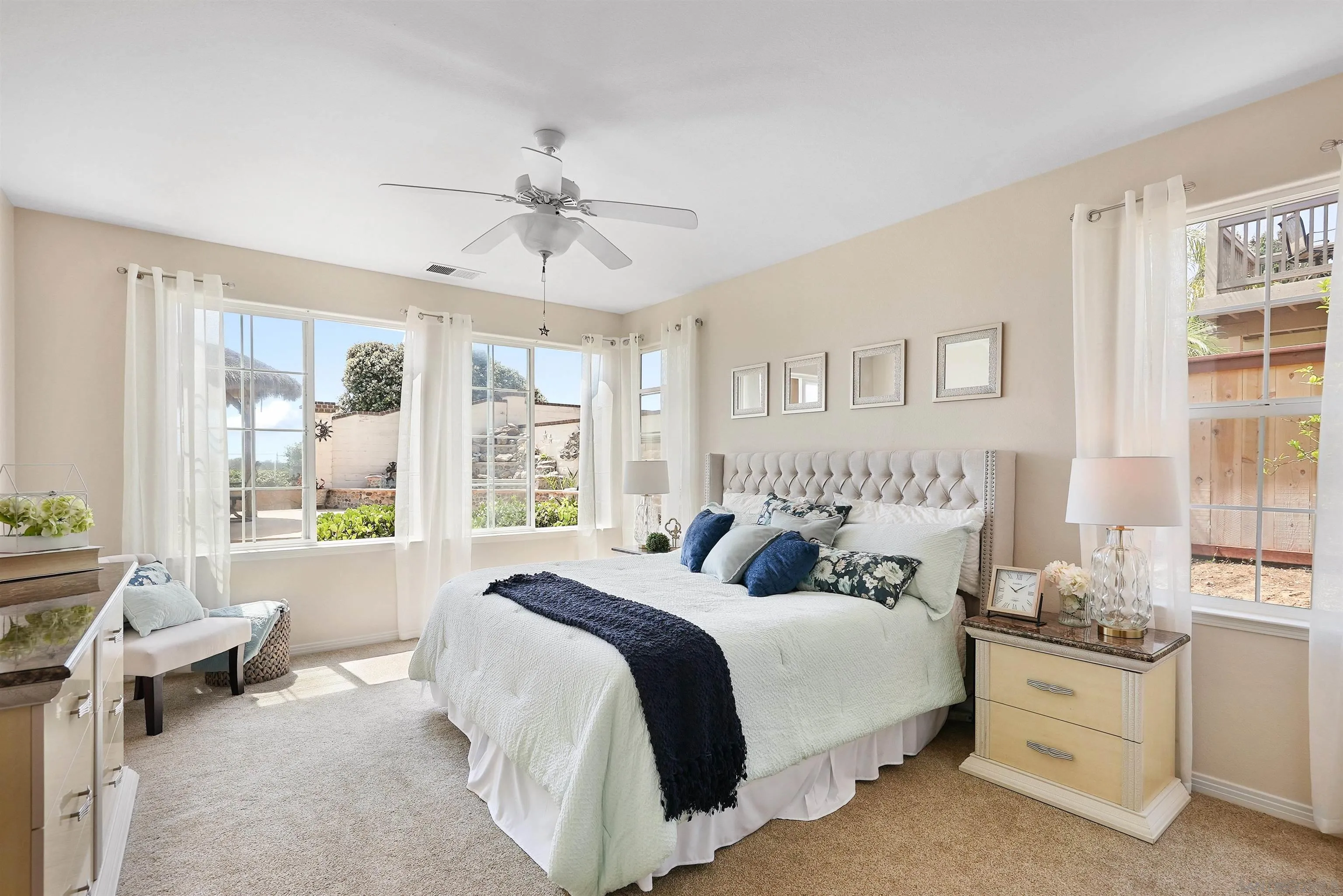 7539 Reeve Road Carlsbad, CA 92011 - Photo 11 of 30 a bedroom with a large bed and a window