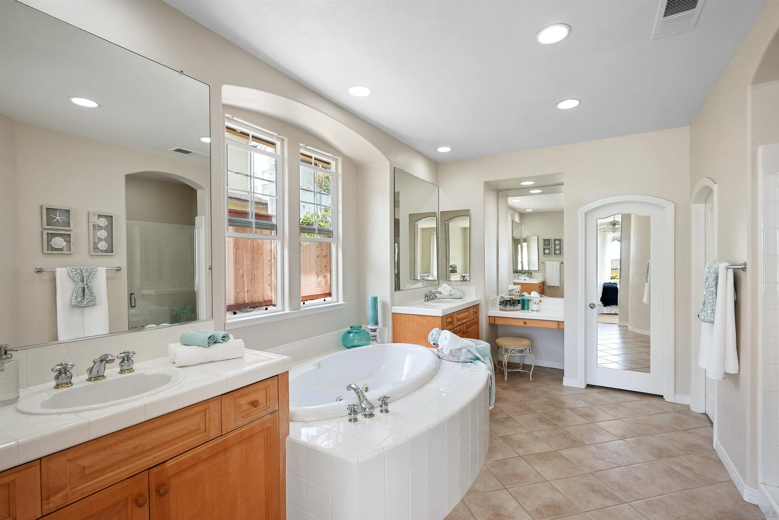 7539 Reeve Road Carlsbad, CA 92011 - Photo 12 of 30 a spacious bathroom with a large tub sink and shower