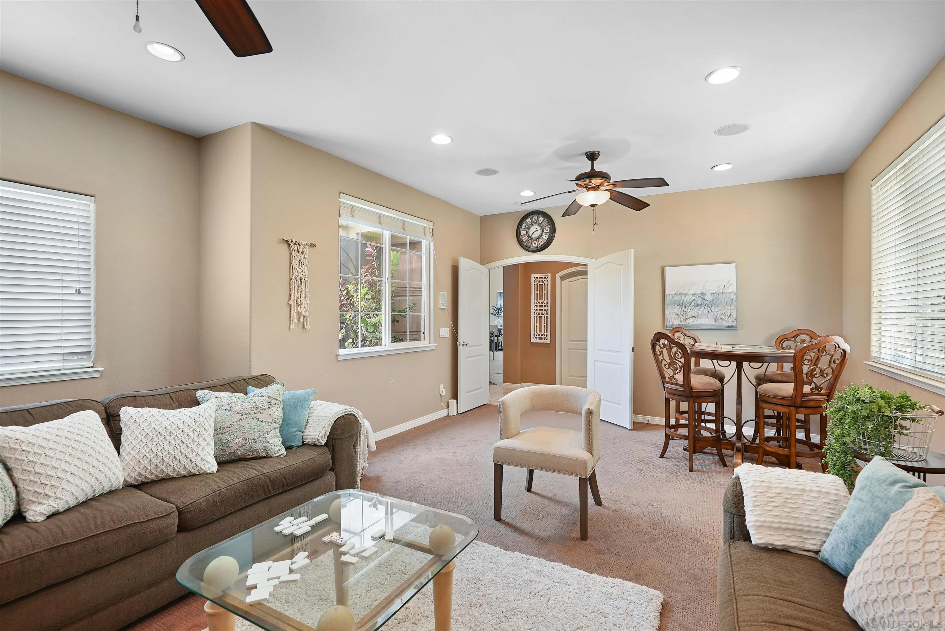7539 Reeve Road Carlsbad, CA 92011 - Photo 15 of 30 a living room with furniture and a large window