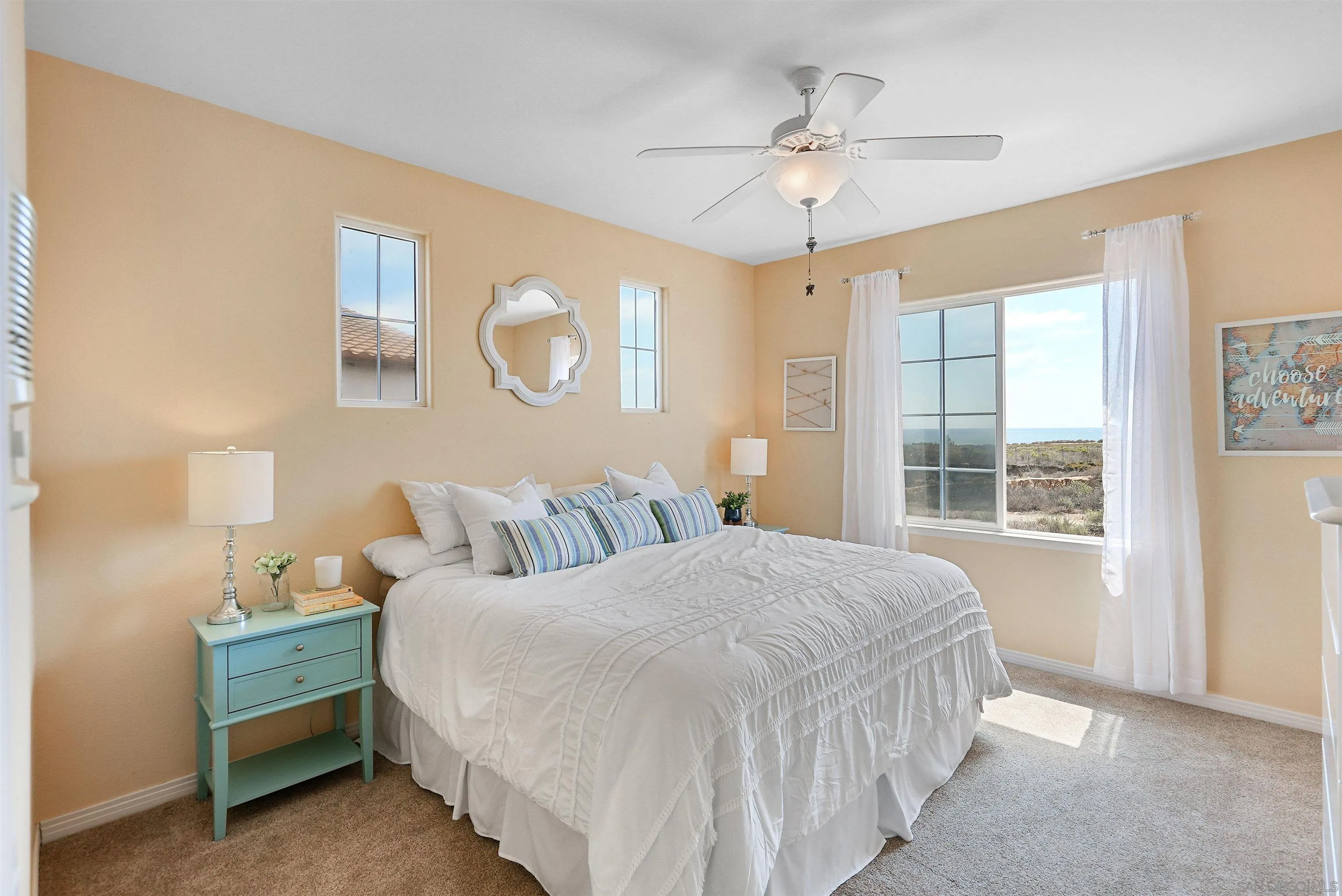 7539 Reeve Road Carlsbad, CA 92011 - Photo 19 of 30 a bedroom with a bed and a table